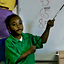 Kindergartener Michael Gordon points out numbers during c...
